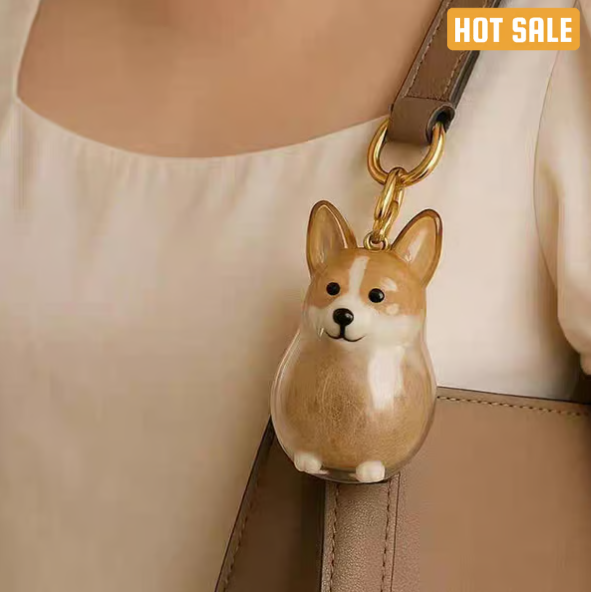 Pet Hair Memorial Capsule Keychain by CC+Tea, small portable keepsake with pet hair encased in clear resin.