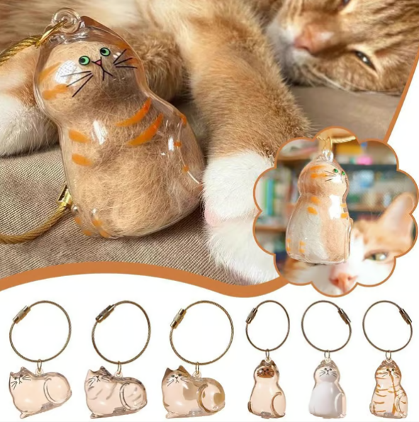 Pet Hair Memorial Capsule Keychain by CC+Tea showing a small, clear capsule keychain designed to hold pet hair as a keepsake.